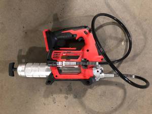 lot 41 image: Milwaukee M18 18V Lithium-Ion Cordless Grease Gun 2-Speed (Tool-Only)   Customer Returns See Pictures