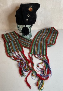 lot 110 image: Earlys of Witney Liberty Cap Torques Knit Cap and Assumptions Woven Sash