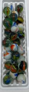 lot 135 image: Lot of 50 Vintage Shooter Marbles