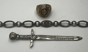lot 309 image: Sword Pendant, US Army Ring, Marine Corp Chain Bracelet
