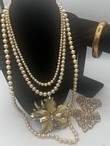lot 317 image: Three vintage faux pearl necklaces, rhinestone shoe clips large brooch Aurora Borealis type crystals