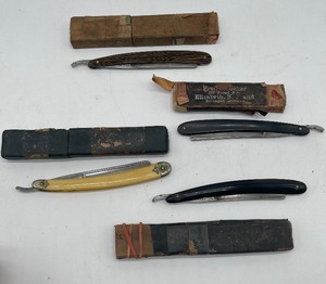 lot 264 image: Four Antique Straight Razors