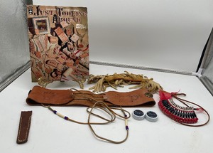 lot 266 image: Leather Laced Belt with conchos and hand tooling, Leather Tooling Magazine