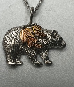 lot 186 image: Fortune and Glory Sterling Sterling Silver Black Hills Gold Bear Pendant and BHG Earrings