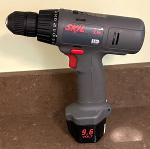 lot 135 image: Skil 38 Inch Cordless Drill with 2 Batteries and Charger