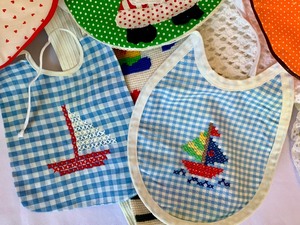lot 95 image: Adorable Vintage Handmade Blankets and Baby Bibs