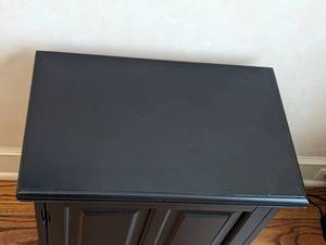 lot 32 image: Small Black Wood Storage Cabinet
