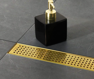 lot 251 image: 24-Inch Brushed Brass Linear Shower Drain with Removable Quadrato Pattern