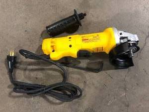 DEWALT 11 Amp Corded 4.5 in. Small Angle Grinder  Customer Returns See Pictures