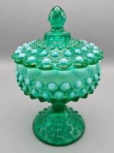 lot 26 image: Fenton Green Opalescent Hobnail Footed Covered Candy Dish