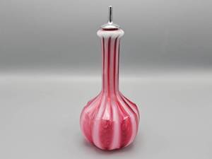 lot 37 image: Fenton Cranberry Striped Glass Barber Bottle