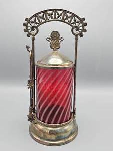 lot 20 image: Victorian Silver Plated Pickle Castor with Swirled Cranberry Glass