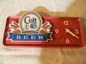 lot 3 image: VINTAGE COLT 45 Beer Bar Clock Advertising Sign - StandingHanging ORIGINAL PIECE FROM A BAR IN NORTHERN MN. - FANTASTIC PIECE - APPROX 11 By 5 - SEE PICTURES