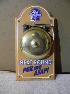 lot 7 image: VINTAGE PABST BLUE RIBBON BEER NEXT ROUND PBR ME ASAP BELL SIGN - FANTASTIC PIECE - APPROX 9 By 16 - SEE PICTURES