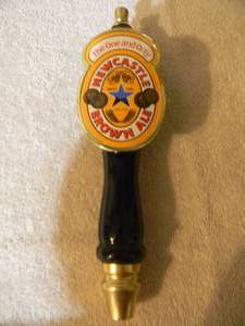 lot 59 image: NEW OLD STOCK - STILL IN PACKAGE - NEW CASTLE BROWN ALE BEER TAP HANDLE - GREAT PIECE - APPROX 12 - SEE PICTURES