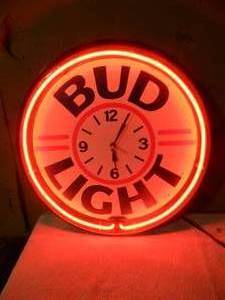 lot 62 image: VINTAGE BUD LIGHT BEER NEON LIGHT  CLOCK - WORKS - FANTASTIC PIECE - APPROX 20 - SEE PICTURES
