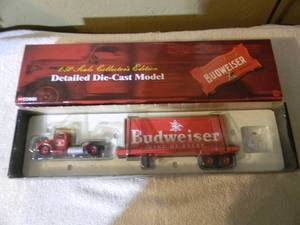 lot 65 image: CORGI ANHEUSER-BUSCK BUDWEISER 150 SCALE DIE-CAST Collectors Edition MACK LJ #50706 - NEW IN BOX - VERY COOL PIECE - SEE PICTURES