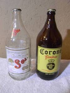 lot 73 image: VINTAGE SOL CERVEZA 940ML BOTTLE & Corona Familiar 940ML BOTTLE - COOL PIECES - SEE PICTURES
