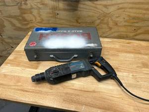 lot 32 image: BOSCH BULLDOG 11224VSR Hammer Drill with Case and Bits