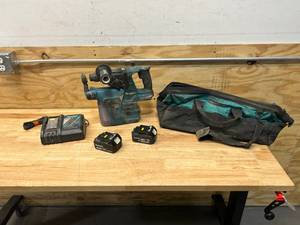 lot 52 image: MAKITA Hammer Drill with HEPA Filter, 2 Batteries, Charger and Bag