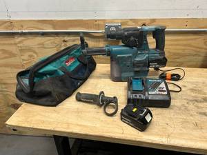 lot 50 image: MAKITA Hammer Drill with HEPA Filter, Charger, 2 Batteries and Bag