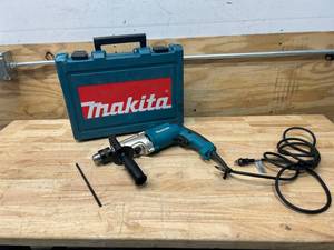 lot 115 image: MAKITA HP2050 Drill with Case (Non-Working)