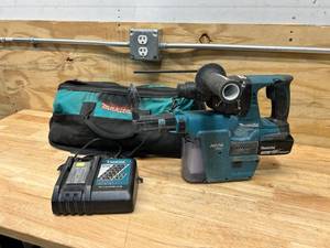 lot 105 image: MAKITA Hammer Drill with HEPA Filter, Charger, Battery and Bag