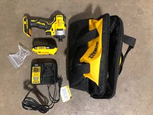 DEWALT ATOMIC 20V Max Lithium-Ion Brushless Cordless Compact 14 in. Impact Driver Kit with 2.0Ah Battery, Charger and Bag   Customer Returns See Pictures