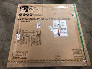 NEW CLASSIC HOME FURNISHINGS Gia 3-Piece Wood Counter Set with 42 in. Counter Drop Leaf Table and 2 Chairs, Cherry   Customer Returns See Pictures