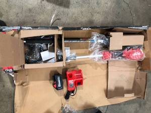 Milwaukee M18 FUEL 10 in. 18V Lithium-Ion Brushless Electric Cordless Pole Saw Kit with Attachment Capability and 8.0 Ah Battery    Customer Returns See Pictures