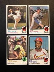 lot 52 image: 1973 Topps Baseball StarHOF Lot - Reggie Jackson, Bob Gibson, Jim Palmer, Don Sutton Vintage Cards