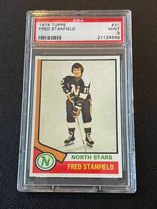 lot 280 image: 1974 Topps Fred Stanfield #31 PSA Graded 9 Mint Minnesota North Stars Vintage Hockey Card