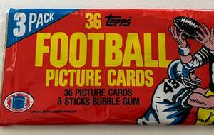lot 21A image: Vintage 1982 Topps Football Grocery Rack Pack - 3 Sealed Cello Packs - Lawrence Taylor  Ronnie Lot Rookie Cards