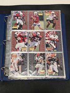lot 210A image: Football Sets - 1995 Skybox, Style Points, Mirror Image, 1996 Skybox Premium - 52 Pages of Cards