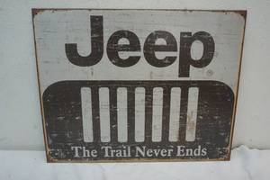 lot 62 image: Jeep tin sign