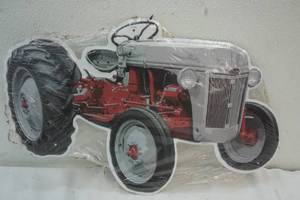 lot 65 image: Tin farm tractor sign