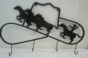 lot 67 image: Metal art, cowboy