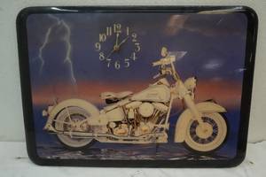 lot 69 image: Harley Sturgis 50 clock on wood