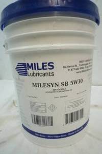 lot 83 image: Miles lubricant, 5 gallons