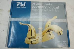 lot 122 image: Gold lavatory faucet
