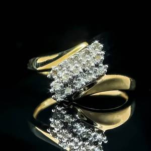 lot 72 image: Diamond Baguette Cascade Cluster Bypass Ring in Yellow Gold