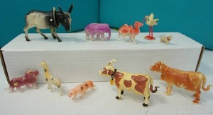 lot 21 image: Collectible Vintage Toys RARE 1930s Celluloid Nodder Bobble-Head Donkey Mule Elephant Camel Lion Giraffe Tiger Cow Bull Stork Lamb Sheep...