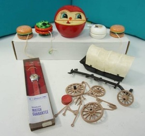 lot 23 image: Collectible Vintage Toy The Wind-up Apple Worm Bank Hong Kong, Mickey Mouse Bradley NIB Watch, Hamburger Frog Garfield Yo-Yo...