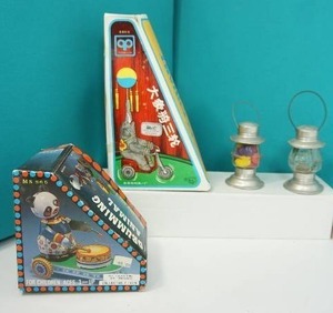 lot 30 image: Collectible Vintage Tin Toy Elephant Bike Wind-Up Tin Toy China NIB, Drumming Panda Wind-Up Toy NIB, Clear Glass Lantern Candy Container Lantern...