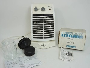lot 42 image: Holmes Countertop Electric Heater, Vector LevelArm, Light Fixture...