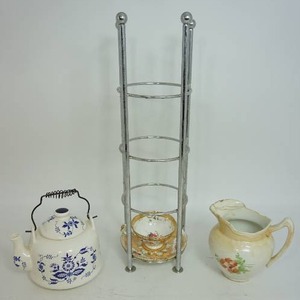 lot 47 image: Ceramic Blue Onion One-Quart Tea Kettle, Metal Tabletop Four-Tier 20-Inch Display, Porcelain Pitcher, Teacup and Saucer...