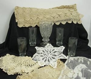 lot 84 image: Collectible Vintage Etched Crystal Glassware, Crocheted Doily Table Linen Etc.