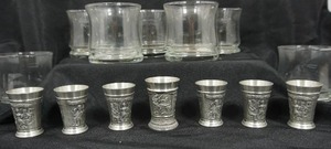lot 123 image: Pewter Zinn Becker Stuttgard Wine Beaker Embossed West German Pewter SKS Relief Shot Glasses Panel Scenes People Animals Etc.