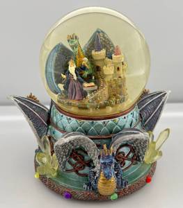 lot 75 image: Vintage Classic Treasures Musical Dragon & Merlin Snow Globe Sculpture