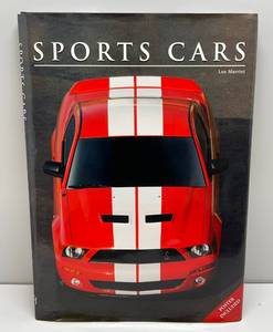 lot 86 image: Oversized Book Sports Cars By Leo Marriot 17 x 24